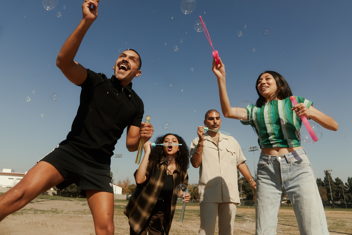 Friends Playing and Having Fun Outdoors